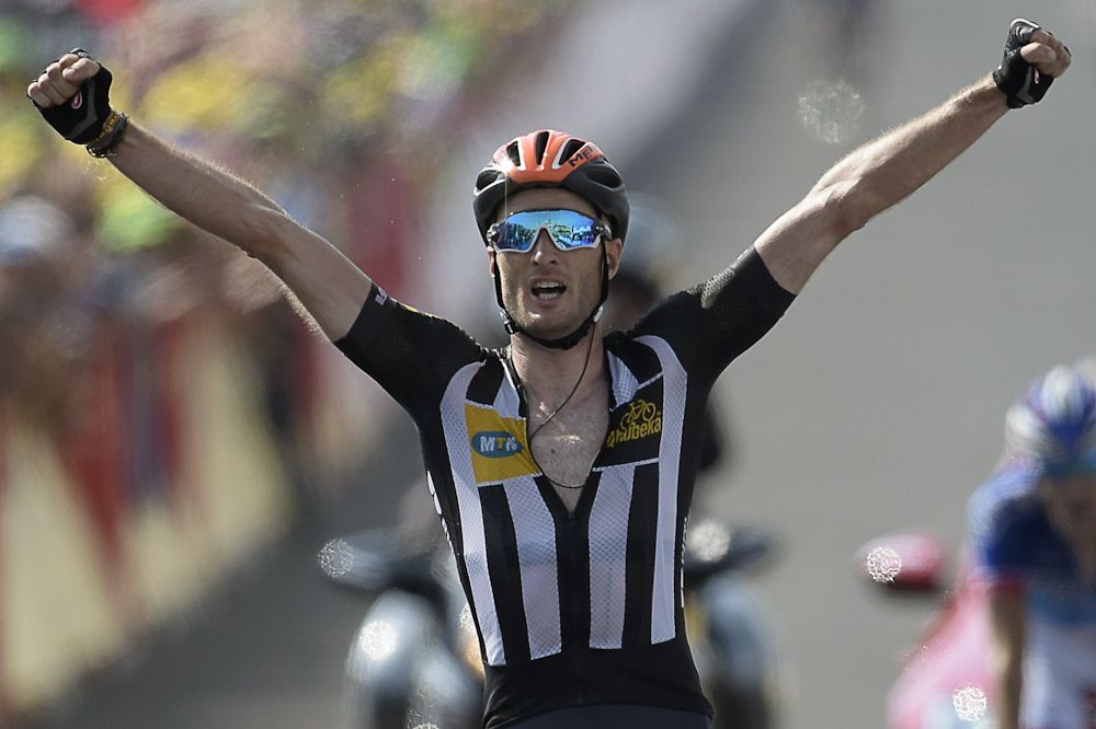 Steven Cummings of African team MTN-Qhubeka wins stage 14 of the Tour de France on Nelson Mandela day.