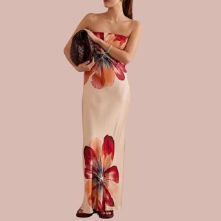 flay lay image of woman wearing cream and pink floral dress