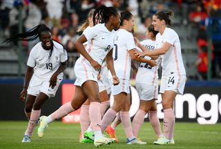 France's forward Marie-Antoinette Katoto (C) celebrates a goal during a friendly football match between France and Vietnam at the Source Stadium in Orleans on July 1, 2022. 