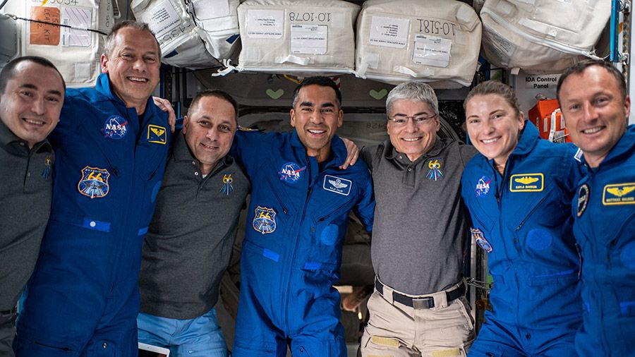 The seven astronauts of the Expedition 66 crew and SpaceX Crew-3 team on the International Space Station. They are: (from left) Pyotr Dubrov of Roscosmos; Thomas Marshburn of NASA; Anton Shkaplerov of Roscosmos; Raja Chari, Mark Vande Hei and Kayla Barron, all from NASA; and Matthias Maurer from ESA. 