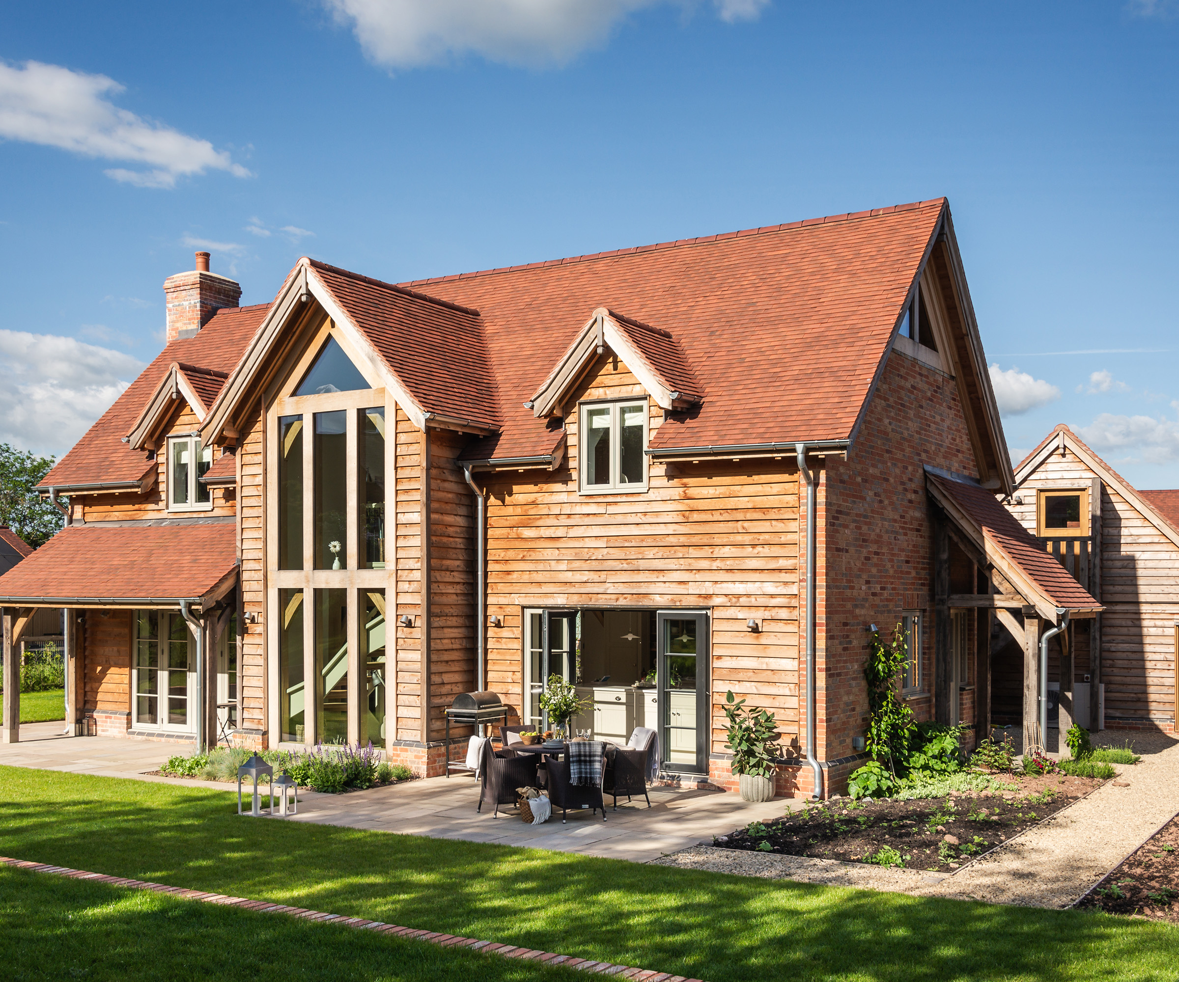 Custom build home with embodied carbon in the oak and softwood panel systems