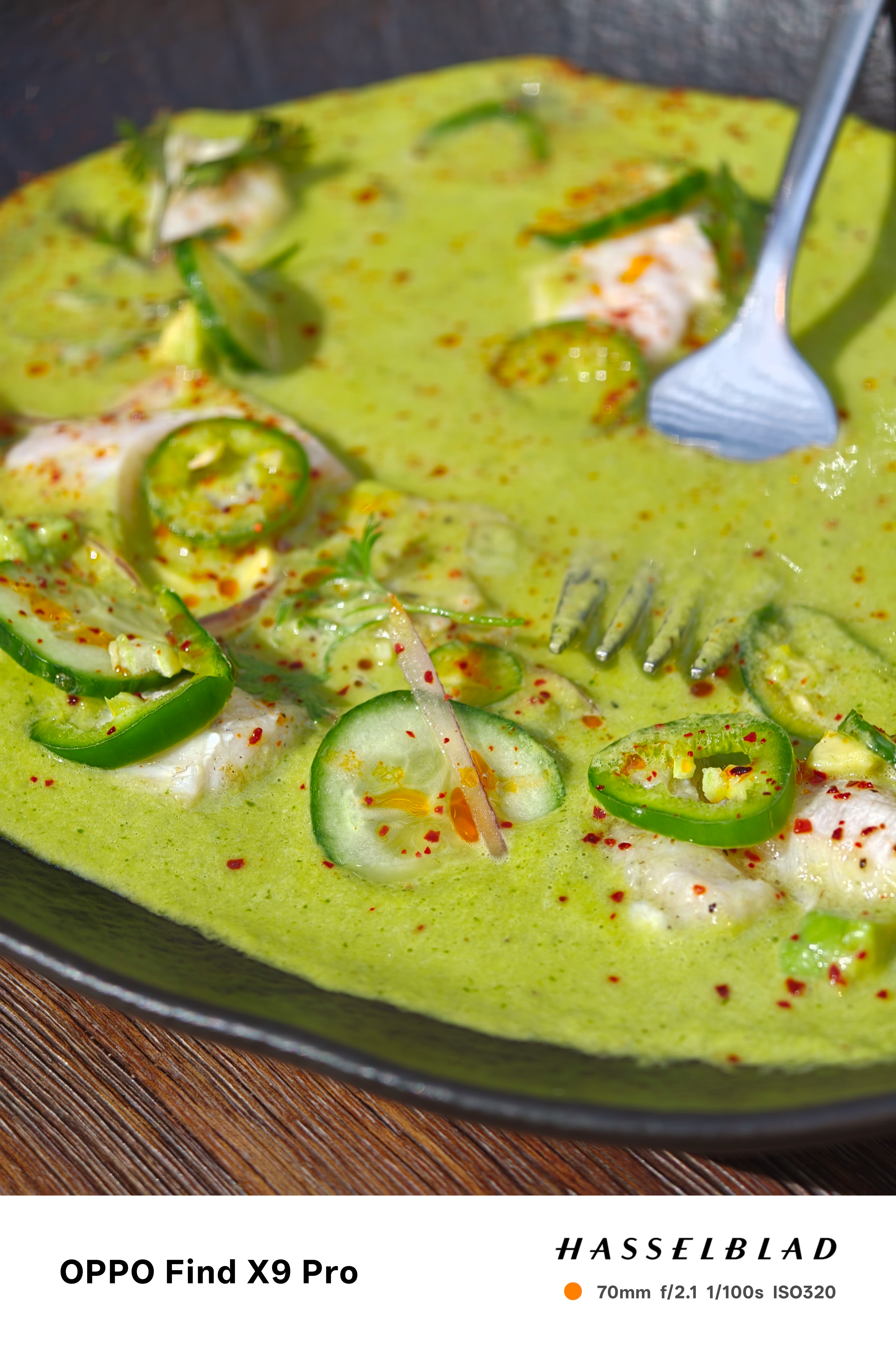 Close-up of a green cucumber and chilli prawn dish
