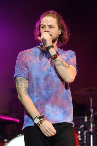 Jay McGuiness of The Wanted performs on stage during day two of the Fusion Festival at Cofton Park, Birmingham.