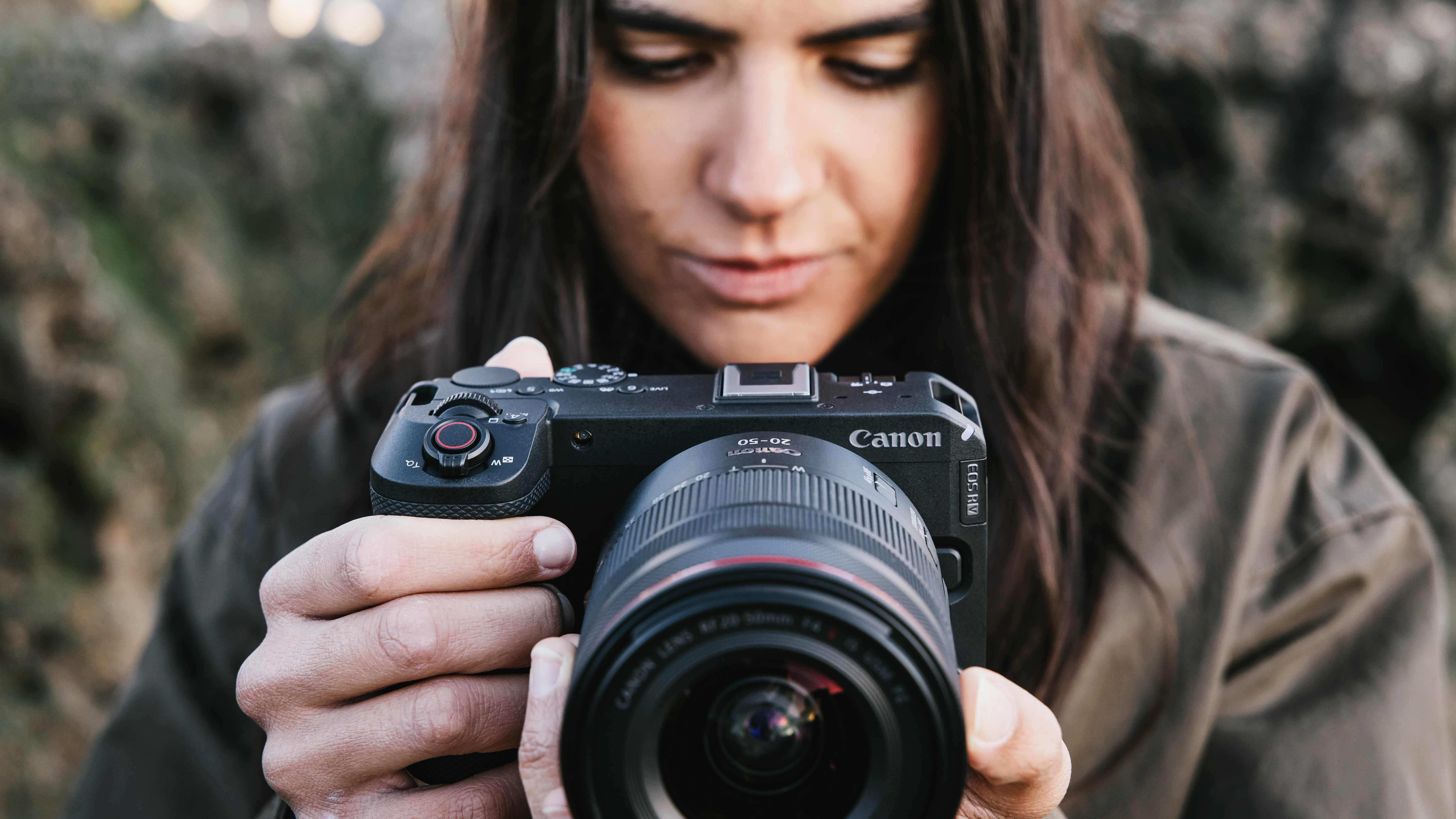 Canon EOS R6 V being used by a videographer outdoors