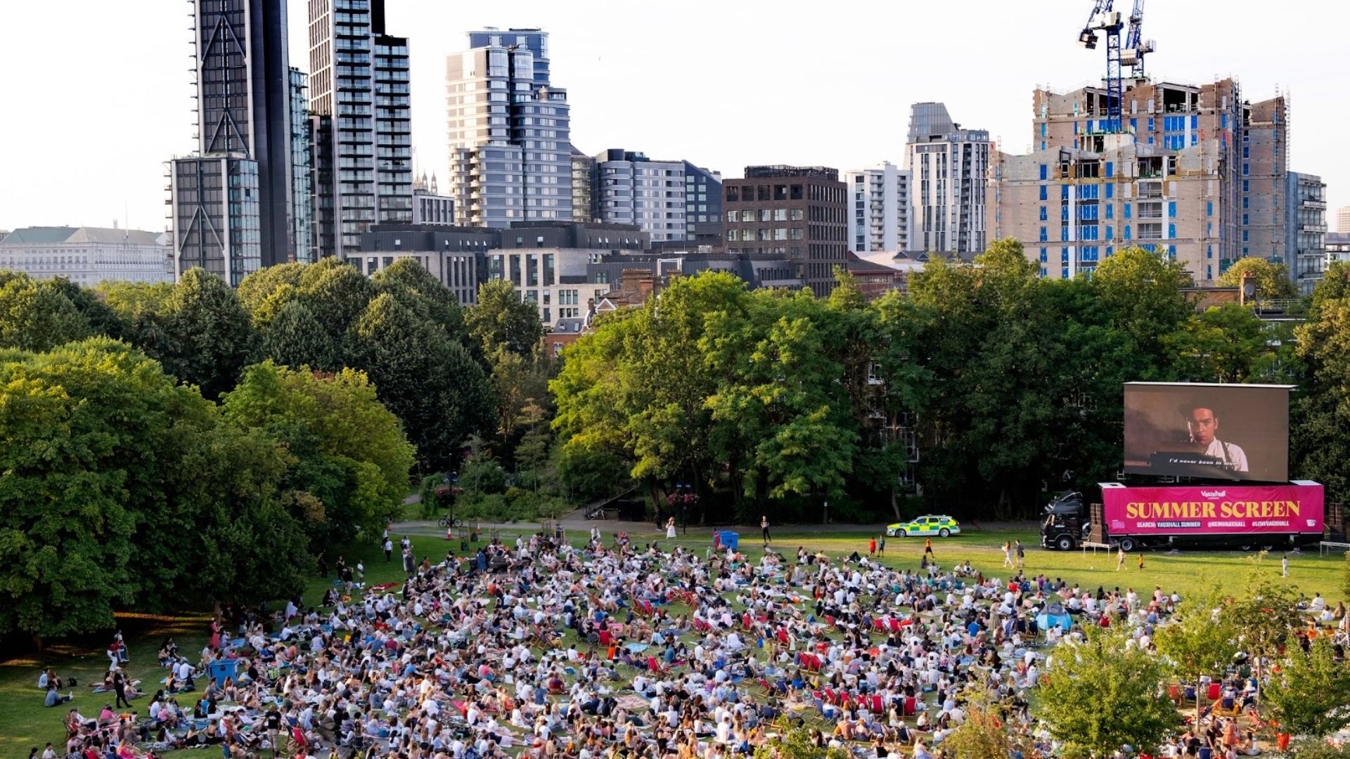 an aerial image of the summer screens crowds watching an outdoor film in 2025