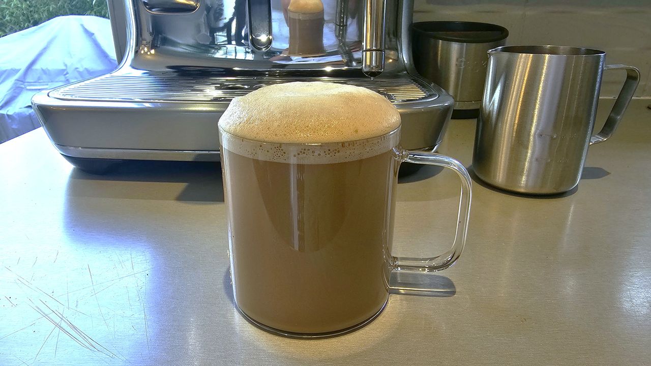Cup of coffee made using Sage Oracle Jet coffee maker