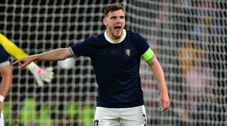 Andy Robertson of Scotland pointing during the 150th Anniversary Heritage Match between Scotland and England at Hampden Park on September 12, 2023 in Glasgow Scotland.