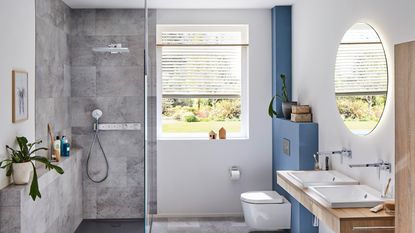 A small , bright bathroom with shower