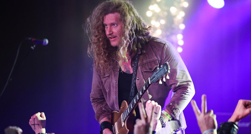 Jared James Nichols waits for a response from the audience as he plays onstage in Nashville, TN. A P-90-equipped Gold Top Les Paul is strapped on his shoulder