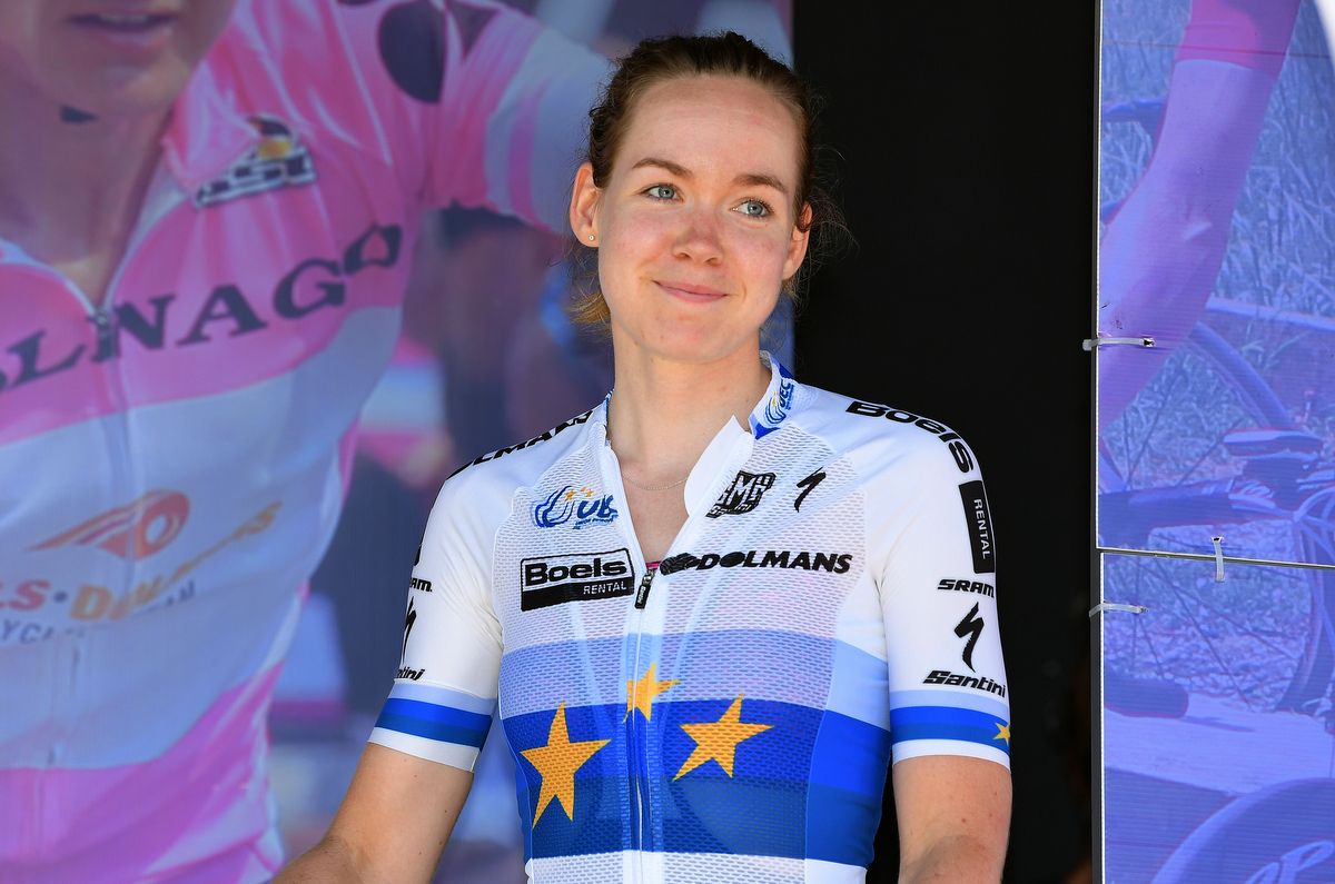 Anna van der Breggen on the podium to collect pink