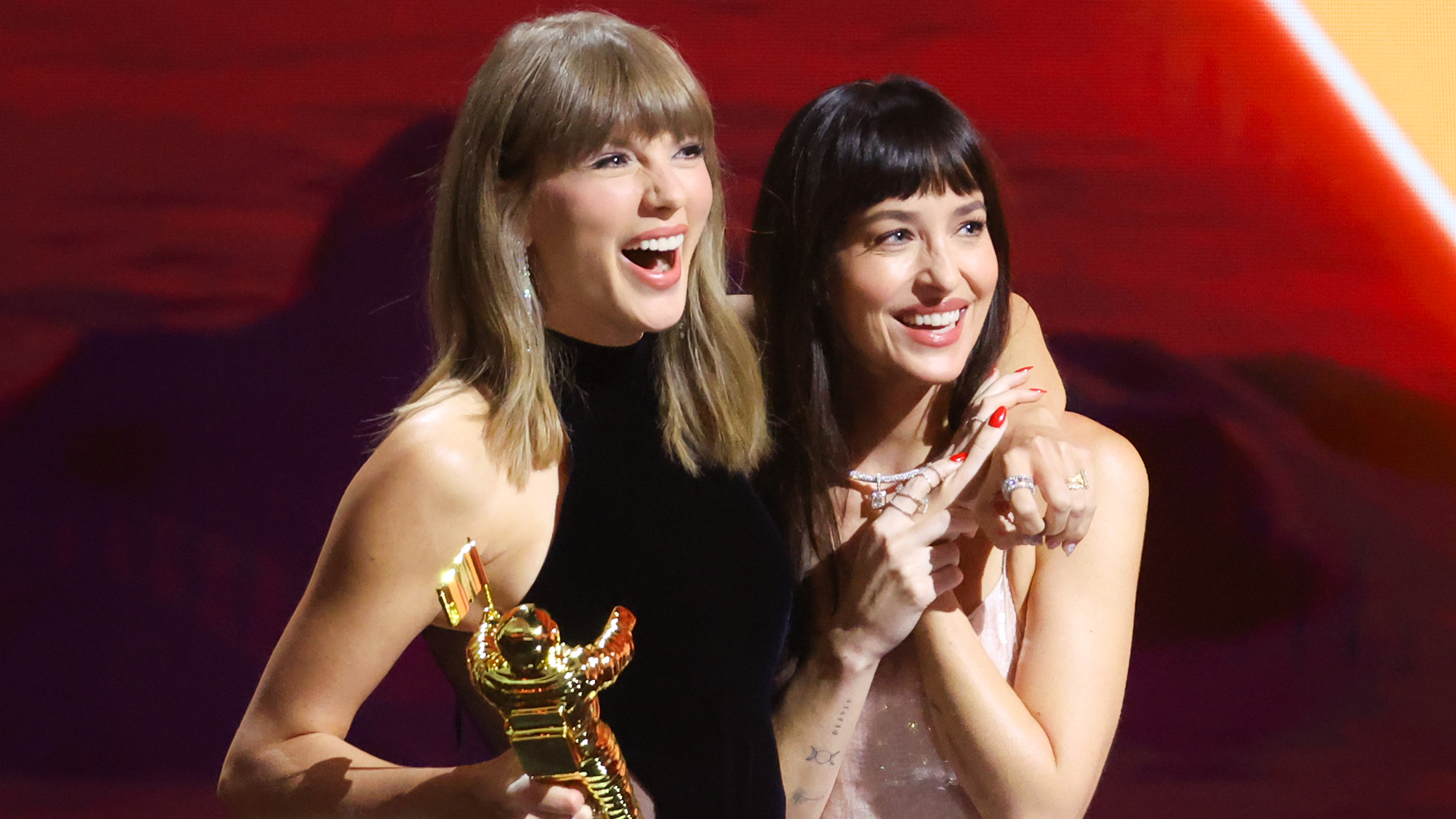 Taylor Swift and Dakota Johnson Mirror Each Other in the Patient Zero Look