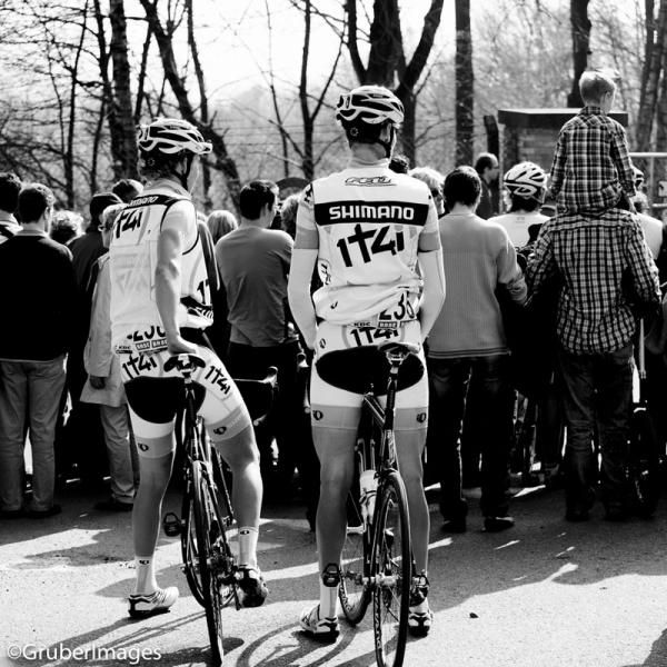 Two 1T4i riders wait patiently behind a crowd of fans