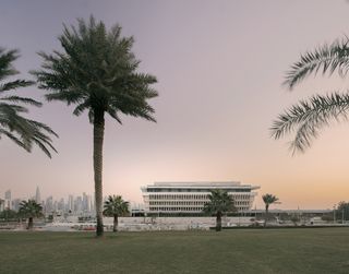 The Ned Doha by David Chipperfield hero exterior with palm tree