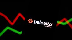 Palo Alto Networks logo and branding pictured on a smartphone screen with stock market growth graph lines in background.