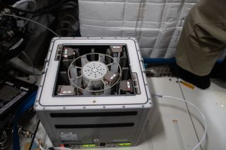 The "BioAsteroid" payload from the University of Edinburgh runs aboard the European Space Agency's Kubik facility in the Columbus module on the International Space Station. The miniature laboratory contains asteroid-like rocky fragments and microbes (a mixture of bacteria and fungi). Scientists hope to use this experiment to understand better how these microscopic little organisms interact with the asteroid-like material, which could later inform asteroid mining efforts