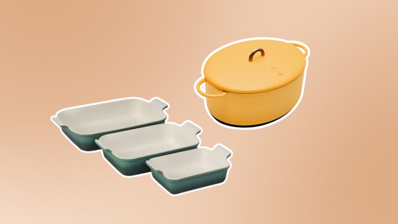 Baking dishes and yellow Dutch oven on light brown background