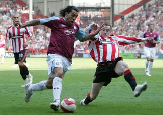 Carlos Tevez in action for West Ham against Sheffield United in 2007