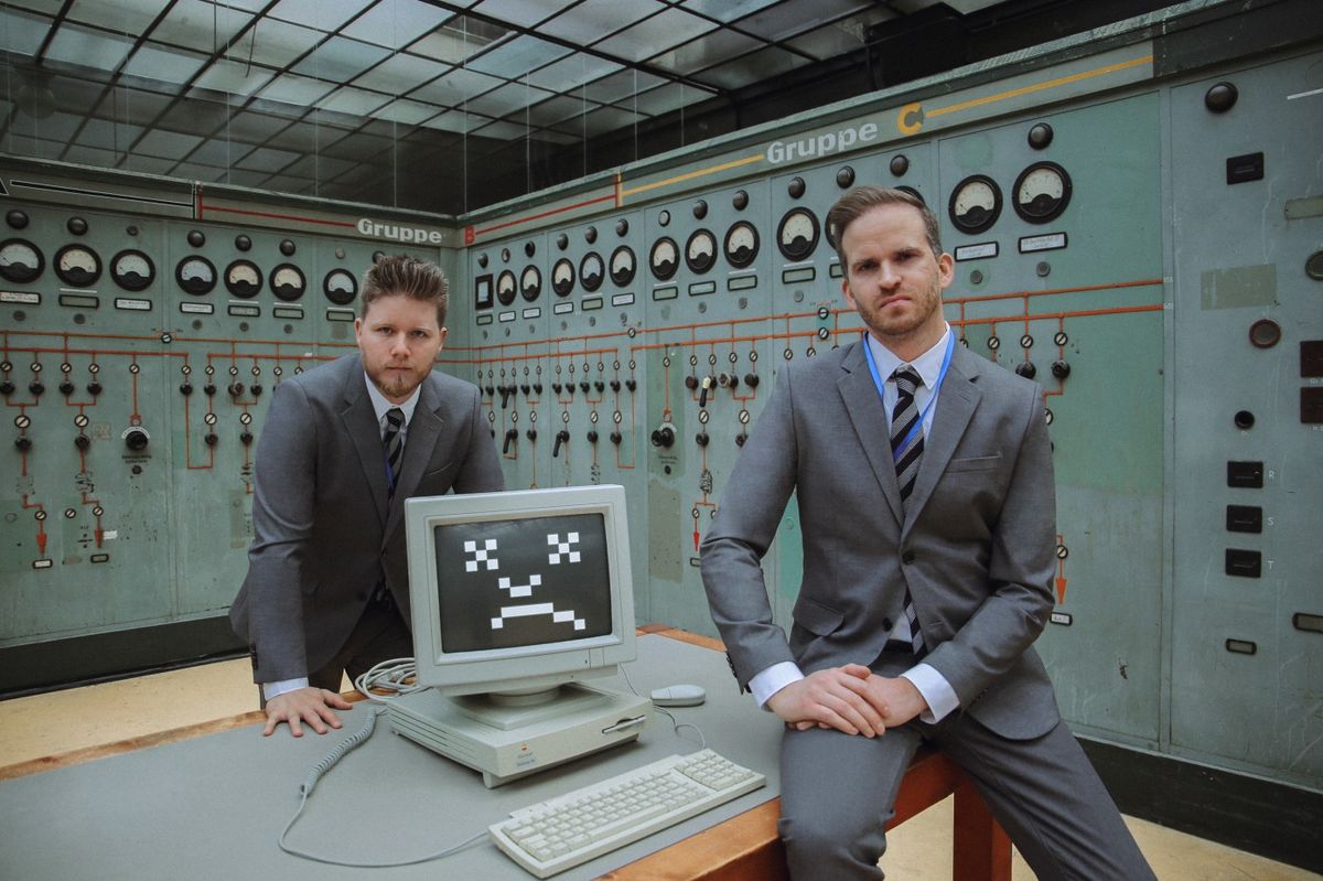 Founders of IT management startup Deeploi pictured in suits 