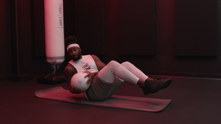 10-Minute Killer Medicine Ball Full Body Workout by FightCamp trainer PJ Shirdan
