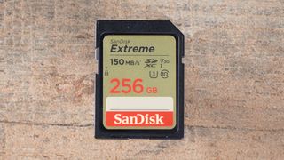 SanDisk Extreme UHS I, one of the best SD cards, on a wooden surface
