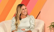 Sarah Jessica Parker sitting in couch at #BlogHer event