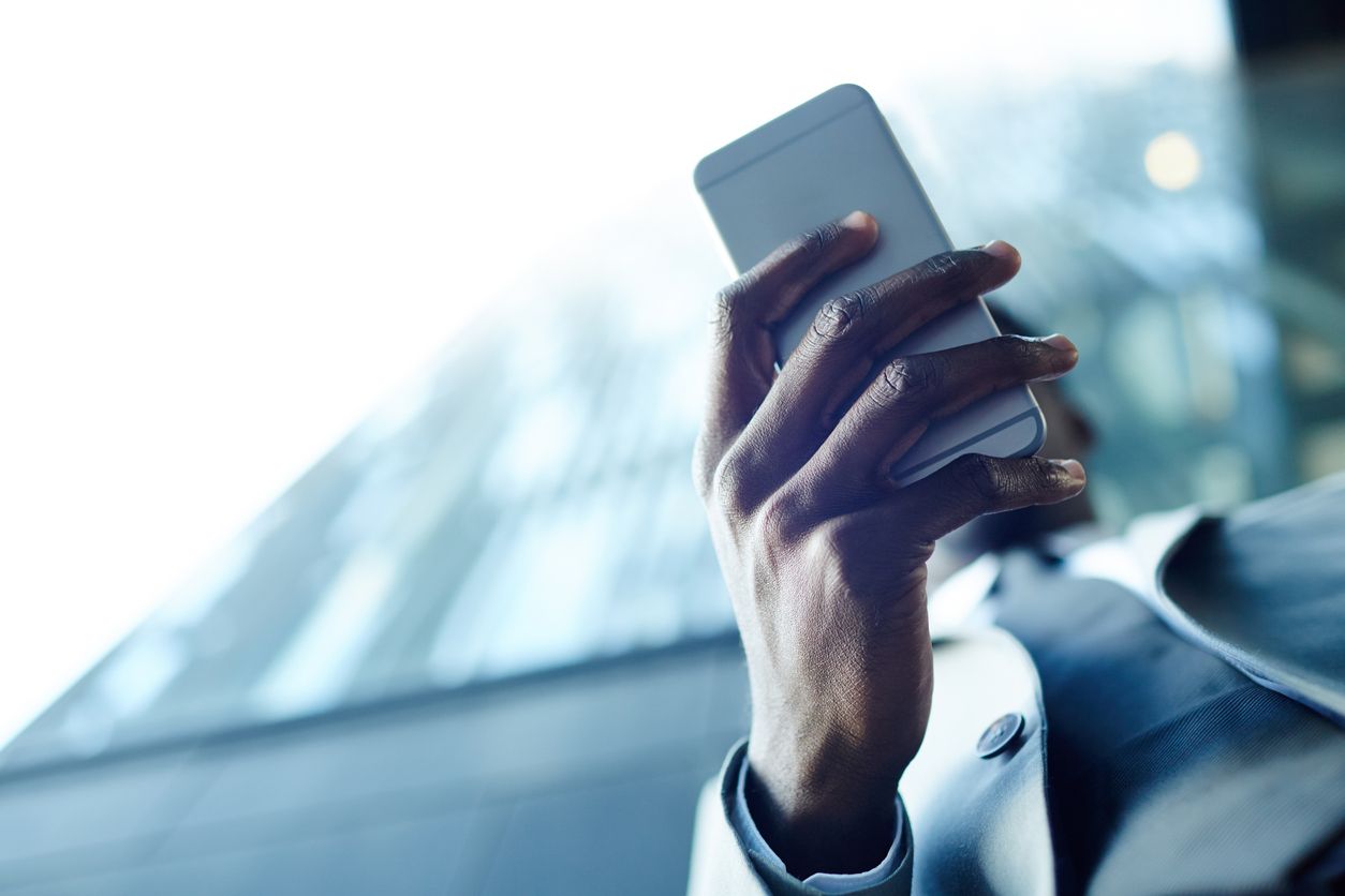 Man holding a smartphone.