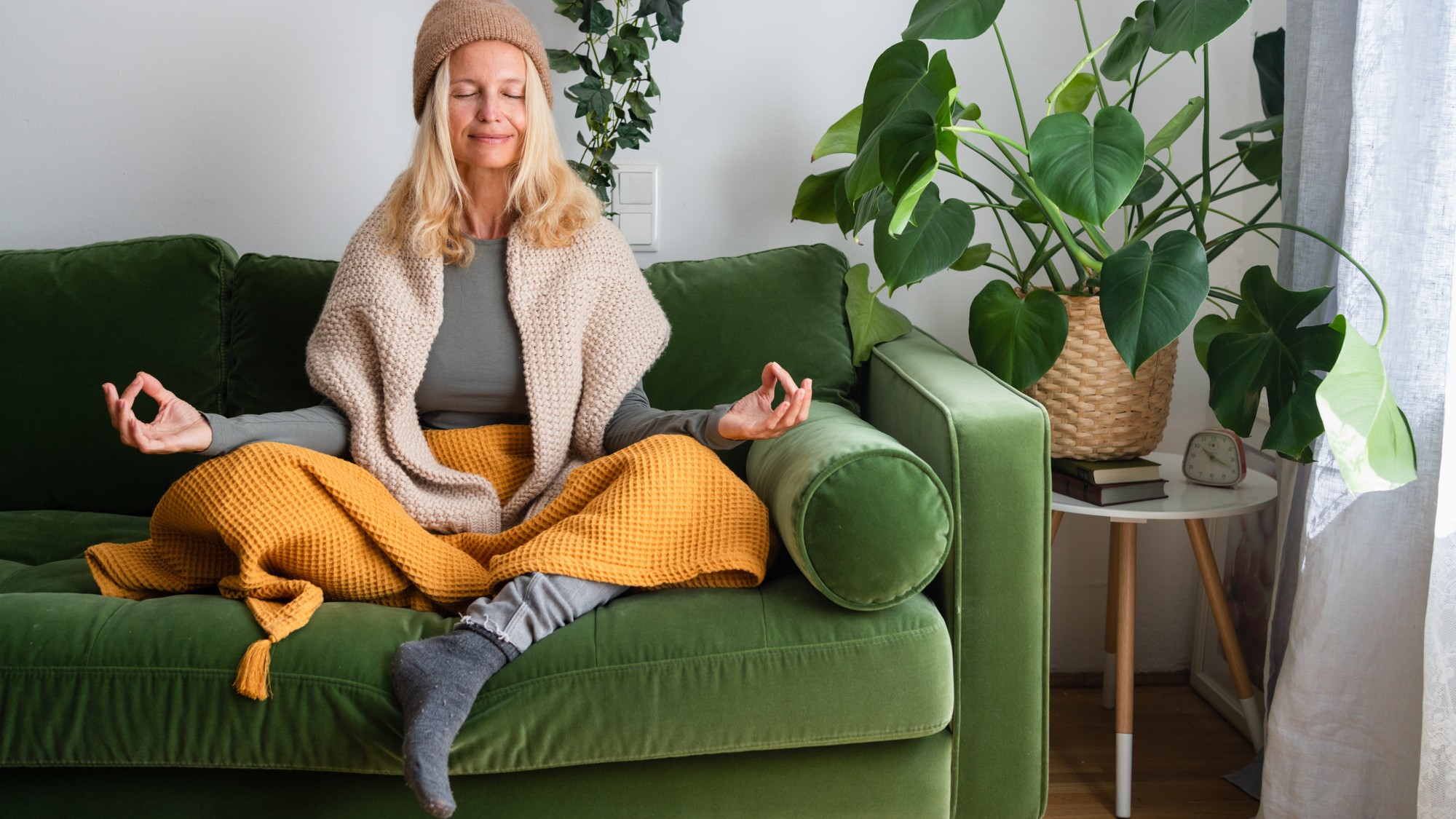 woman sitting on couch