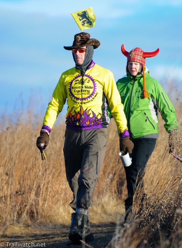 'Cross fans walking through Wisconsin&rsquo;s tall grass