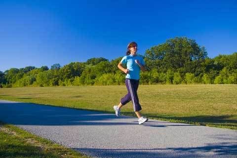 woman running on a street