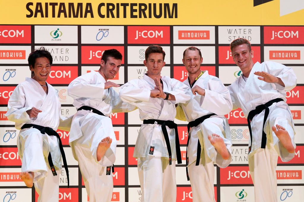 Riders do karate and football-darts before the 2019 Saitama Tour de France criterium