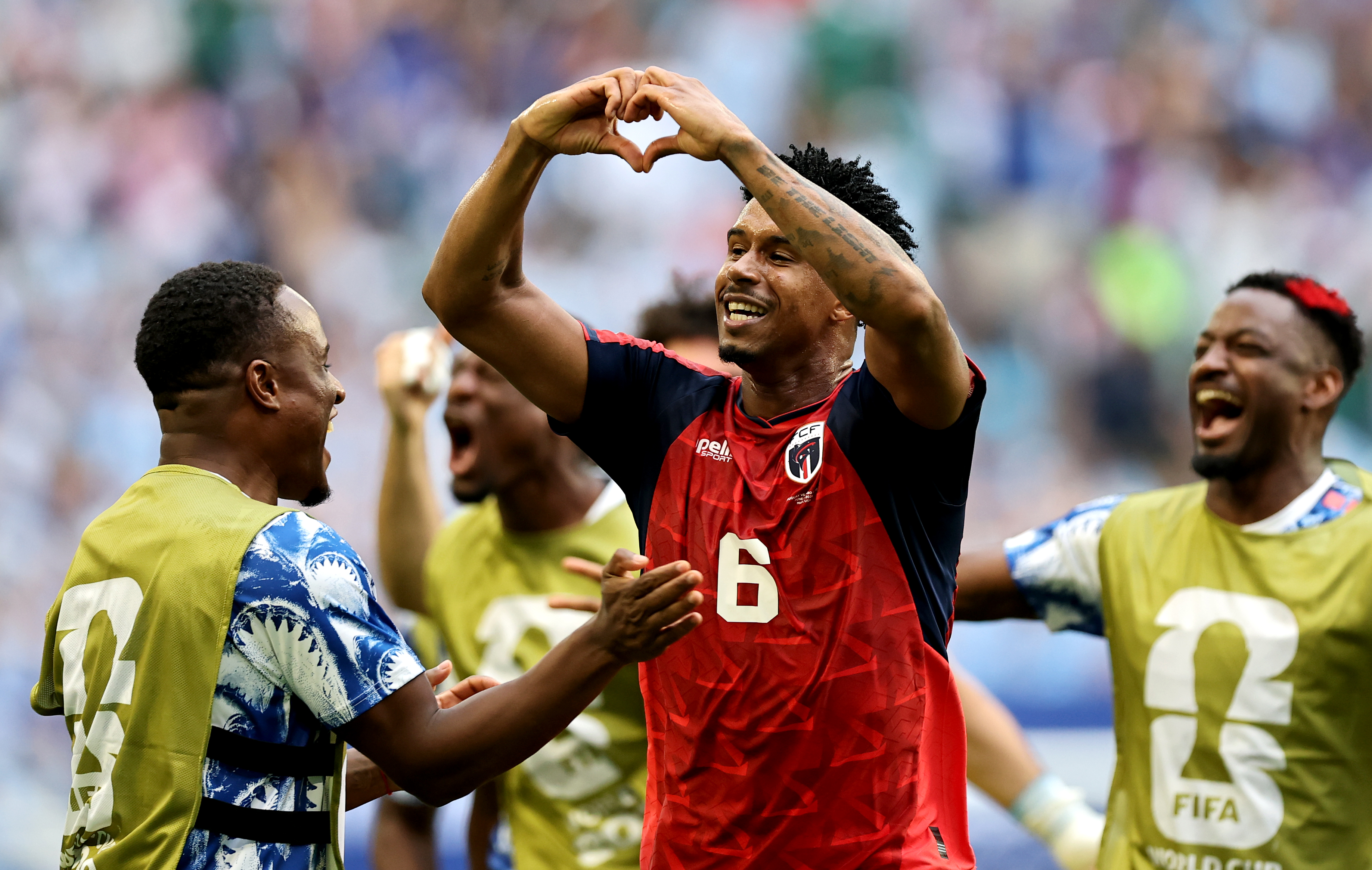 MIAMI GARDENS, FLORIDA - JUNE 21: Kevin Pina #6 of Cabo Verde celebrates with teammates after scoring the team&amp;apos;s first goal during the FIFA World Cup 2026 Group H match