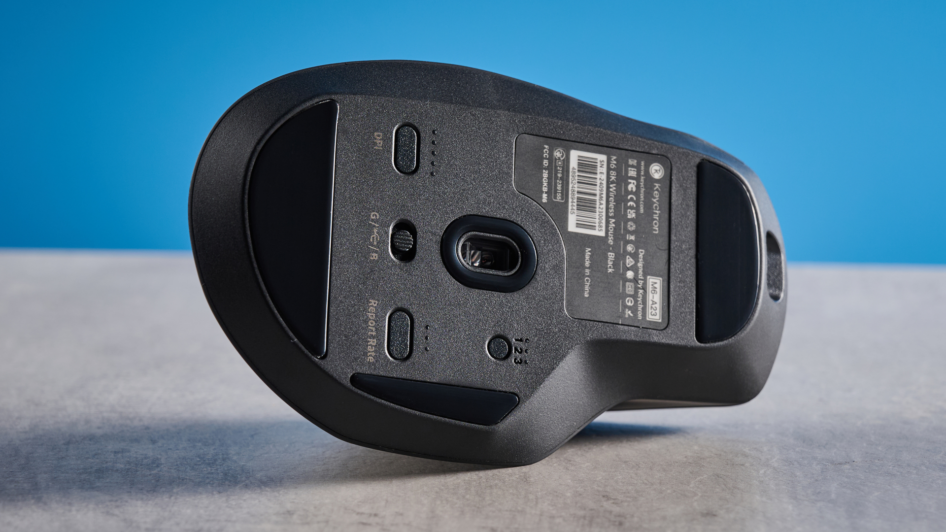 A black Keychron M6 8K ergonomic mouse