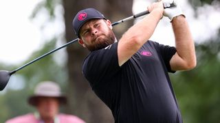 Tyrrell Hatton takes a shot during LIV Golf Greenbrier