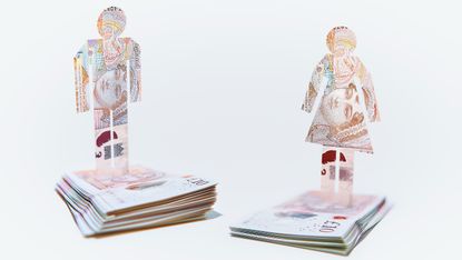 Male and female cut-out figures on top of bundles of £10 notes