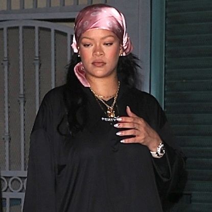 Rihanna wore satin pink sneakerinas from Prada for her first outing post-giving birth to a baby girl