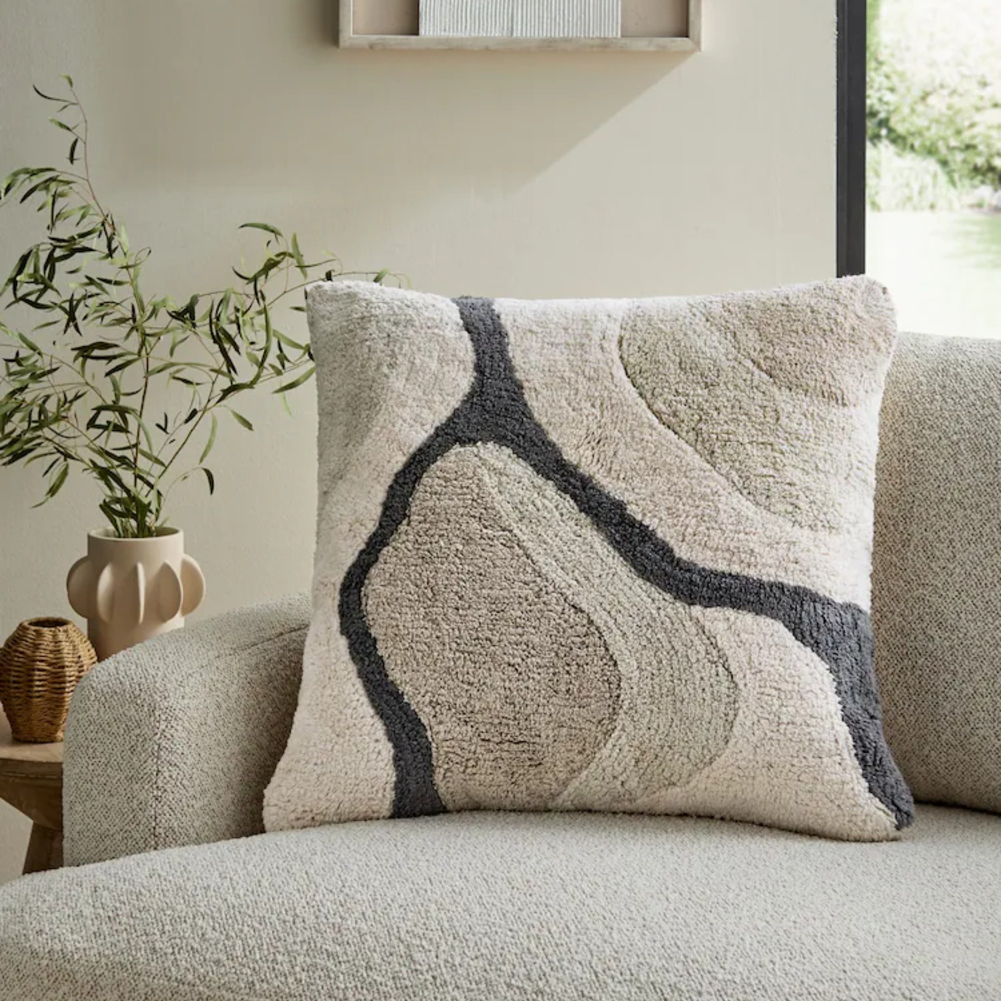Monochrome 50 x 50cm Abstract Berber River Cushion from Next on a boucle sofa