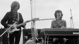 Eric Clapton (left) and Steve Winwood perform with Blind Faith at London's Hyde Park