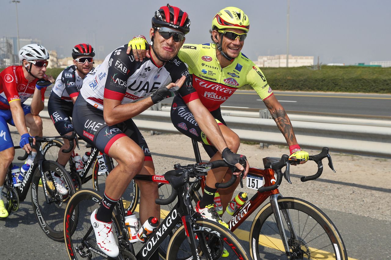 Filippo Pozzato shares a joke with Filippo Ganna