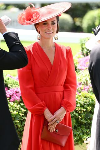 Catherine, Princess of Wales carried a red clutch as she attends day four of Royal Ascot 2023 at Ascot Racecourse on June 23, 2023 in Ascot, England.