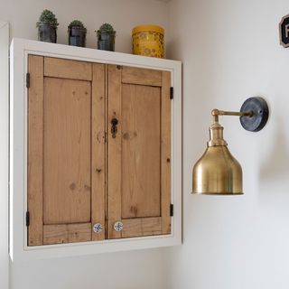 old kitchen cabinets to mount on the bathroom wall