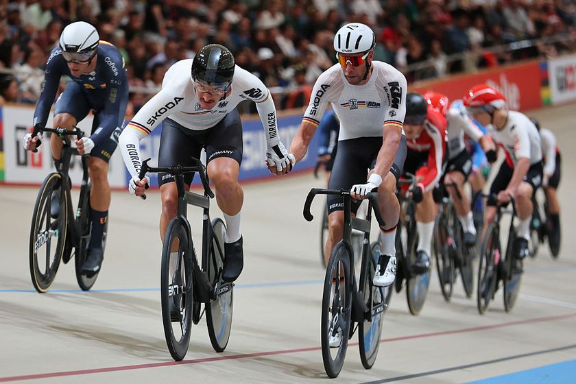 Germany&#039;s #21 Moritz Augenstein (L) and #22 Roger Kluge compete in the men&#039;s madison 50km event final at the 2025 UCI Track World Championships, in the Penalolen Velodrome in Santiago, on October 26, 2025. (Photo by Javier TORRES / AFP)