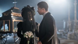 Kalyne Coleman and Jacob Anderson at a funeral in Interview with the Vampire