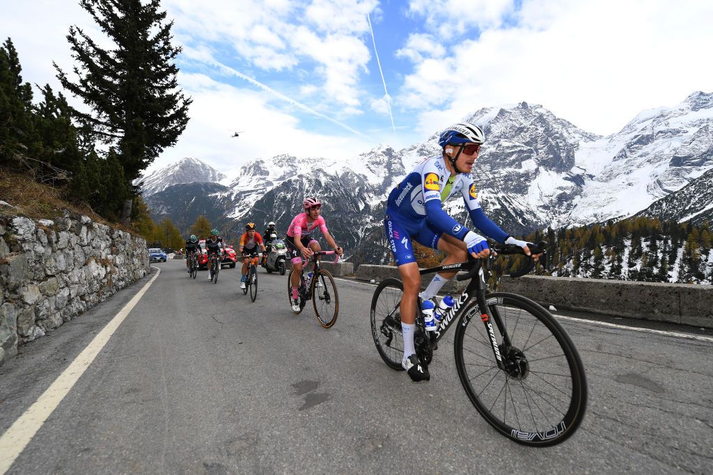 LAGHI DI CANCANO ITALY OCTOBER 22 Hermann Pernsteiner of Austria and Team Bahrain Mclaren Joao Almeida of Portugal and Team Deceuninck QuickStep Pink Leader Jersey Fausto Masnada of Italy and Team Deceuninck QuickStep Passo dello Stelvio Stilfserjoch 2758m Landscape Mountains Snow during the 103rd Giro dItalia 2020 Stage 18 a 207km stage from Pinzolo to Laghi di Cancano Parco Nazionale dello Stelvio 1945m girodiitalia Giro on October 22 2020 in Laghi di Cancano Italy Photo by Tim de WaeleGetty Images