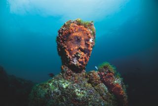 ruins of underwater statue