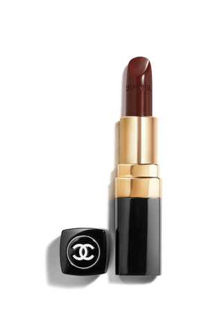 A tube of chanel lipstick against a white background.