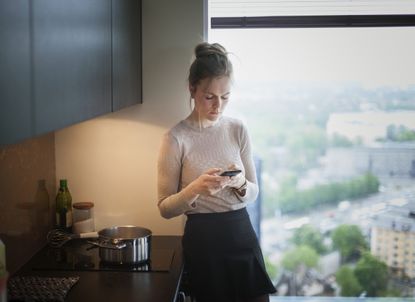 woman googling self-isolation rules UK