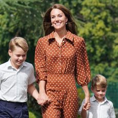 Princess Kate and Prince William walk their children, Prince George, Princess Charlotte, and Prince Louis, to school.