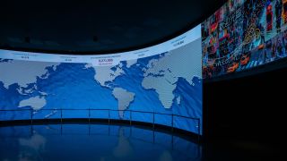 One World Observatory replaced its aging projection system in its welcome center with an expansive floor-to-ceiling Planar TVF Series LED video wall that displays the origin of visitors on a world map.