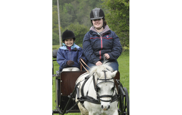 Emily Ham with young driver Khyra Payne and her pony Charlie on a Mid Wales BDS training day