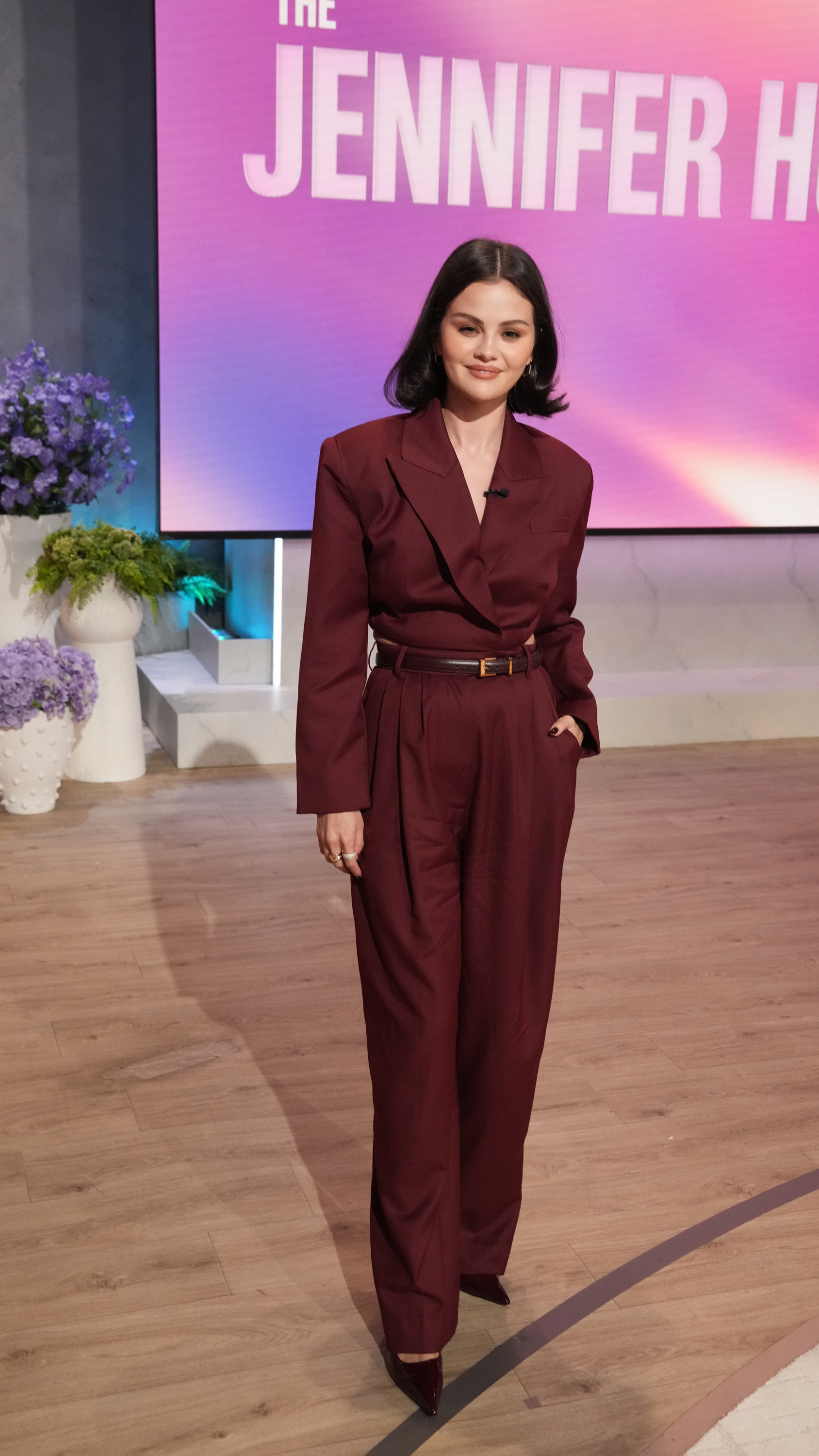 Selena Gomez appeared on the Jennifer Hudson show in a burgundy suit-inspired jumpsuit